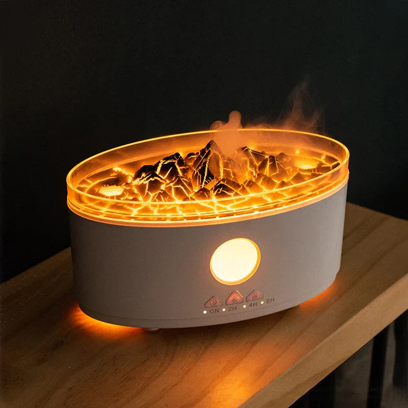Diffuser Humidifier - Volcano/mountain style humidifier with warm orange interior lighting, emitting mist, resting on a wooden surface against a dark background
