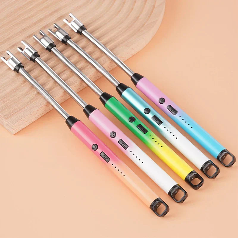 Flameless Plasma Lighter - Six long-handled flexible neck electric lighters in various gradient color finishes arranged diagonally on a wood slice against a peach background