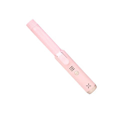 Pink mini wireless curling wand on white background, portable hair styling tool