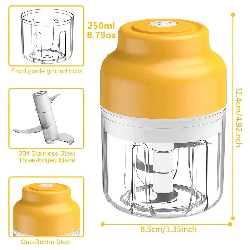 Compact electric mini garlic chopper held in hand