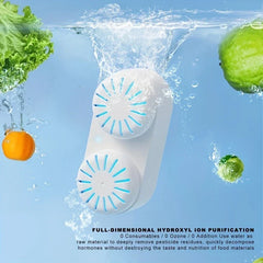 Fruit Vegetable Purifier Washer Capsule - White dual-rounded unit submerged in water surrounded by produce, with text about hydroxyl ion purification at the bottom