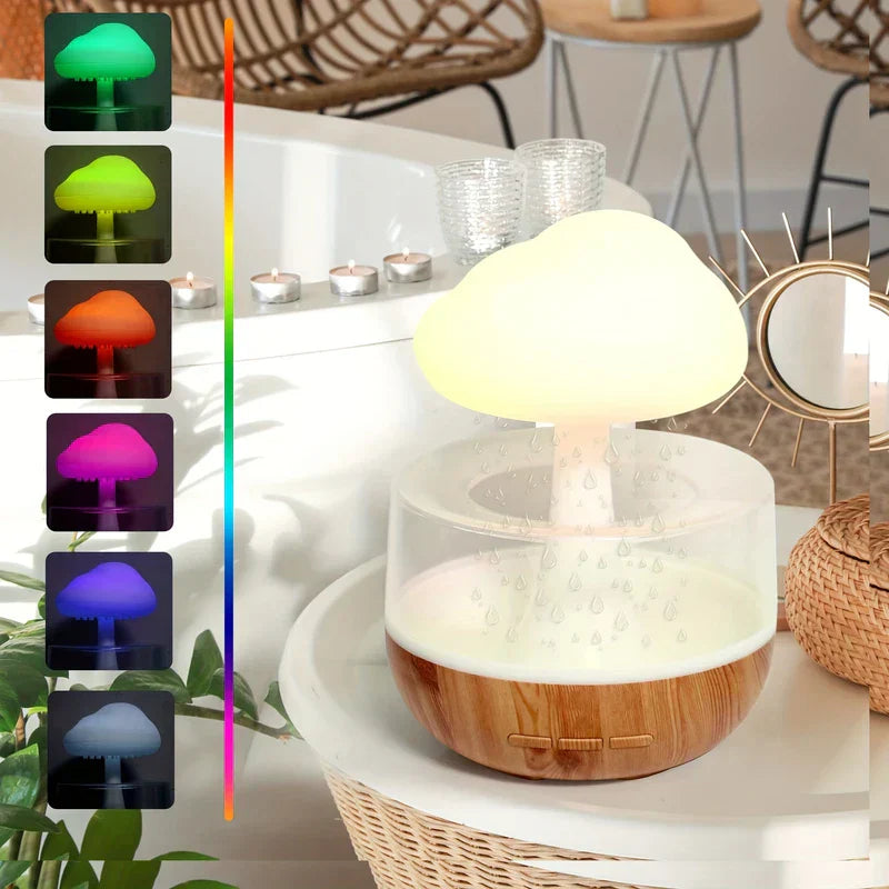 Warm glowing cloud humidifier diffuser on bathroom table, with 6 colored light effect previews shown along the left side