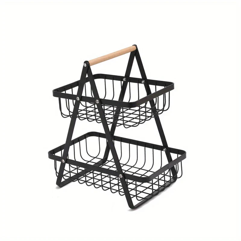 Frutero de hierro forjado - Cesta de almacenamiento de alambre negro rectangular de dos niveles con asa superior de madera sobre fondo blanco