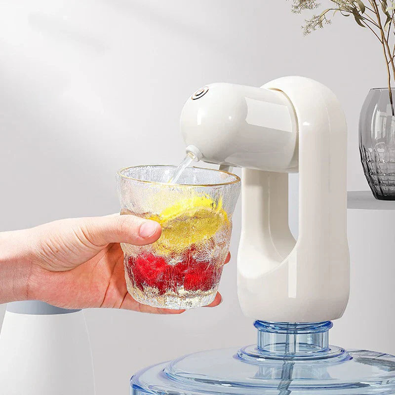 White water pump on a jug, pouring water into a glass held by a hand