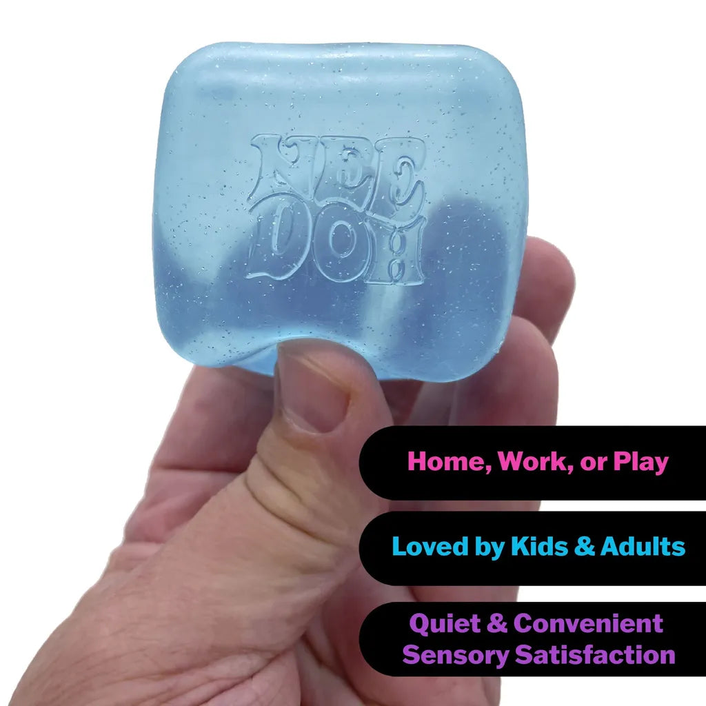 Nice Cube - Hand holding a translucent light blue glittery rounded cube, three black text bubbles to its right.