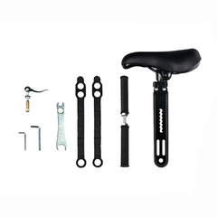 Bike Seat - Bike child seat and all included installation hardware laid out on a plain white background
