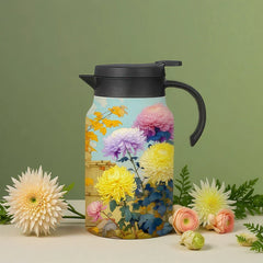 Vintage Floral Tea Thermos - Insulated carafe with chrysanthemum floral print, black lid and handle, displayed with fresh cut flowers