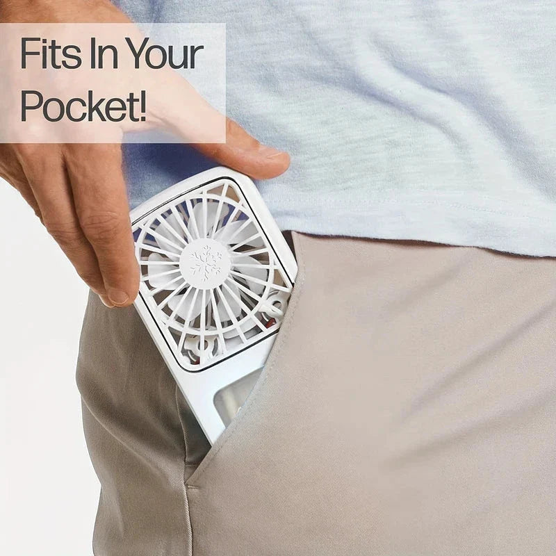 Portable Fan - A person placing the same white handheld fan into the pocket of light beige pants.