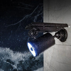 Motion Sensor Light - Black outdoor solar spotlight with water droplets on it, lit, shown against a rainy, stormy backdrop with lightning.