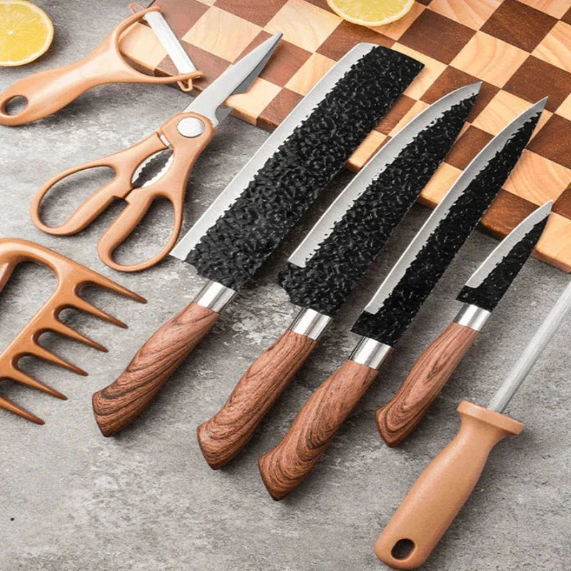 Hammered Knife Set - 8-piece kitchen tool set arranged on gray stone surface with checkered wooden cutting board and lemon slices