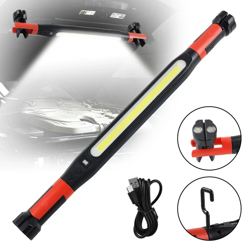 Rechargeable LED work light with USB cable, magnetic clamp ends, and pull-out hook, shown clipped under a car hood emitting light.