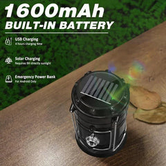 Top view of black camping lantern with a solar panel on its top, on a wooden surface, text reads 1600mAh BUILT-IN BATTERY with charging details