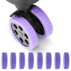 Luggage Suitcase Wheels Protection Covers - Purple silicone luggage wheel protectors installed on a dual spinner wheel, with 8 loose protectors displayed below.