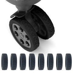 Luggage Suitcase Wheels Protection Covers - Close-up of a dual-wheel luggage caster with treaded tires, showing eight matching spare caster tires aligned below