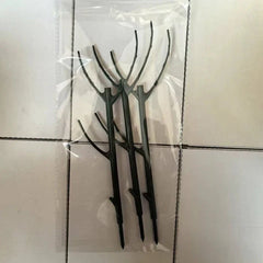 Plant Support Stakes - 3 dark green twig-shaped stakes in clear plastic packaging on tiled surface