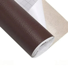Rolled brown leather repair kit adhesive sheet with grid backing paper and fabric layer partially unrolled.