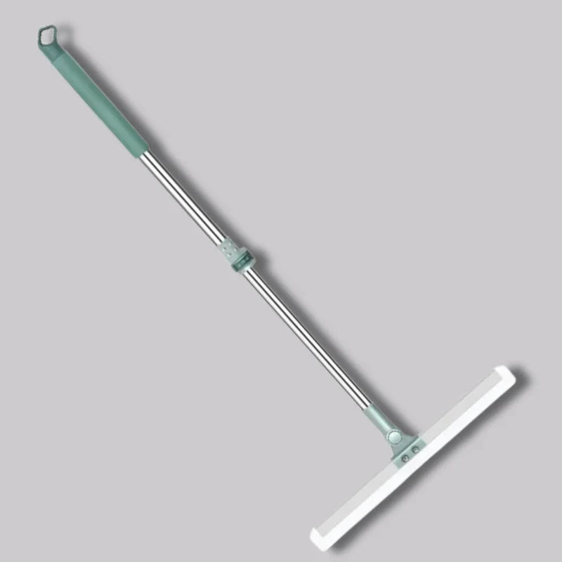 Magic Broom - Full cleaning tool with adjustable metal pole, teal grip accents, and flat rubber cleaning head against a plain gray background
