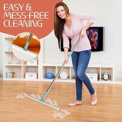 Magic Broom - Person using the cleaning tool to wipe soapy spills from a hardwood living room floor, with inset close-up of the blade clearing liquid spills