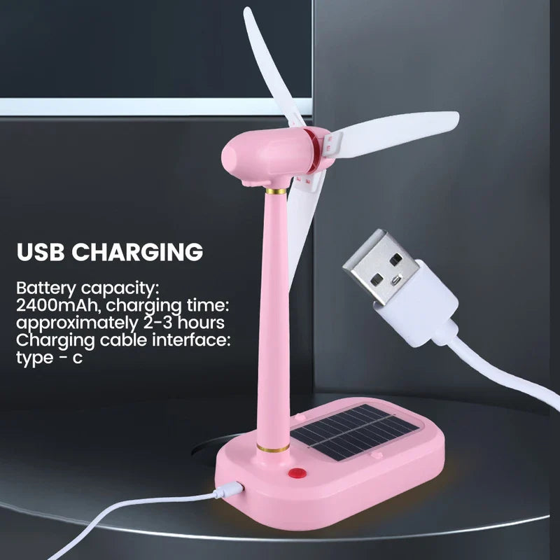 مروحة تعمل بالطاقة الشمسية - مروحة توربين رياح شمسية وردية مجمعة موصولة بكابل USB-C، مع تفاصيل الشحن المطبوعة على اليسار.