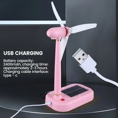 مروحة تعمل بالطاقة الشمسية - مروحة توربين رياح شمسية وردية مجمعة موصولة بكابل USB-C، مع تفاصيل الشحن المطبوعة على اليسار.