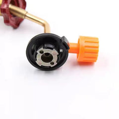 Outdoor Gas Canister Refill Adapter - Close-up of the canister connection end of a brass gas adapter with an orange valve knob.