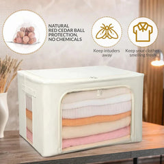 Beige fabric storage bin with clear front window, and small cedar balls in a mesh bag; the cedar cashmere storage bag is visibly present.
