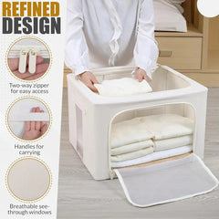 A person places folded clothing into an open cedar cashmere storage bag, highlighting zipper, handle, and window design details.
