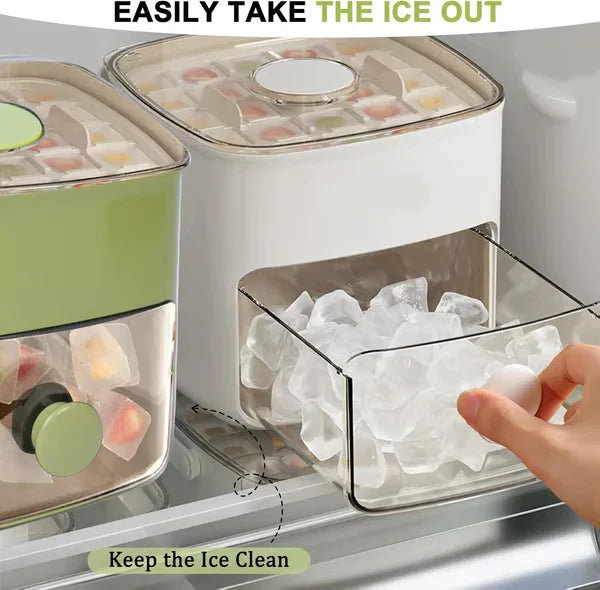 Hand takes ice from the clear drawer of a portable ice maker on a fridge shelf, with a second unit beside it