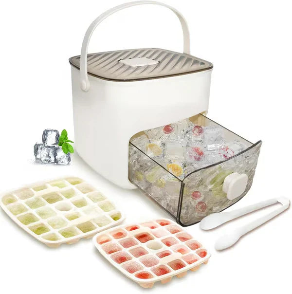 White portable ice maker set with two ice cube trays, ice tongs, and a drawer of frozen fruit ice cubes