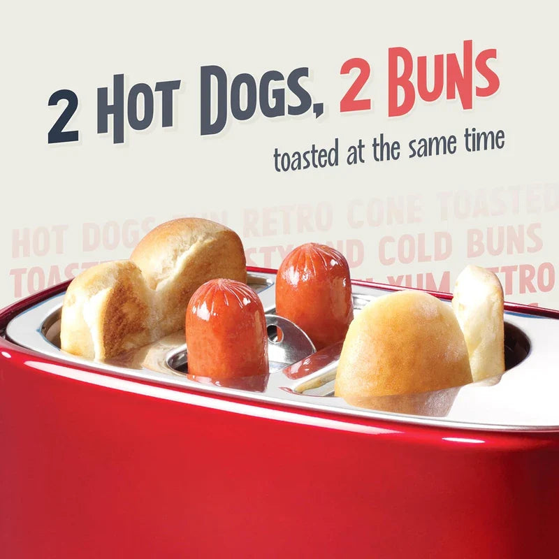 Close-up of a retro hot dog toaster’s top slots holding two cooked hot dogs and two hot dog buns.