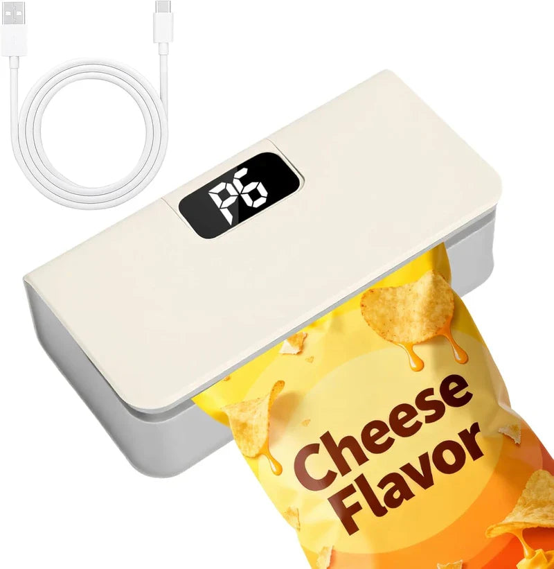 Mini Bag Sealer - Cream and gray sealer sealing an open cheese flavored chip bag, with white USB-C charging cable placed beside it