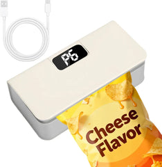 Mini Bag Sealer - Cream and gray sealer sealing an open cheese flavored chip bag, with white USB-C charging cable placed beside it