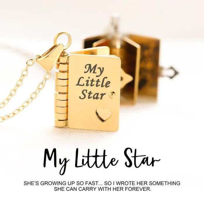 book necklace with star pendant on a child model