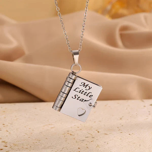 Book Necklace - All-silver book pendant on silver chain, engraved 'My Little Star' with a recessed silver heart accent and side clasp