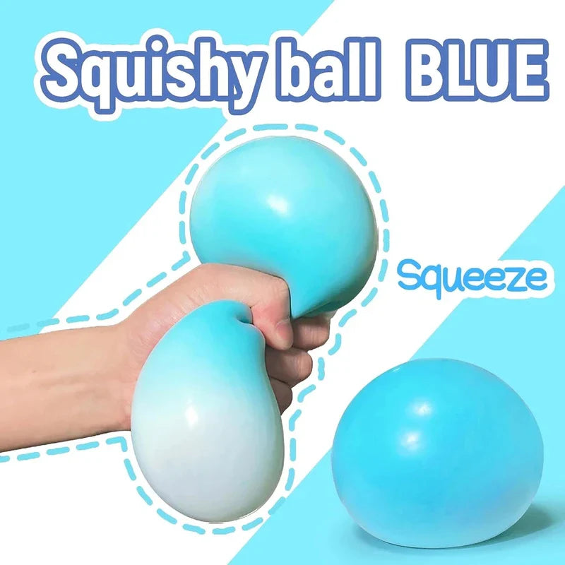 Giant Stress Ball - A hand squeezes a light blue squishy ball, with an unsqueezed matching blue ball to the lower right.