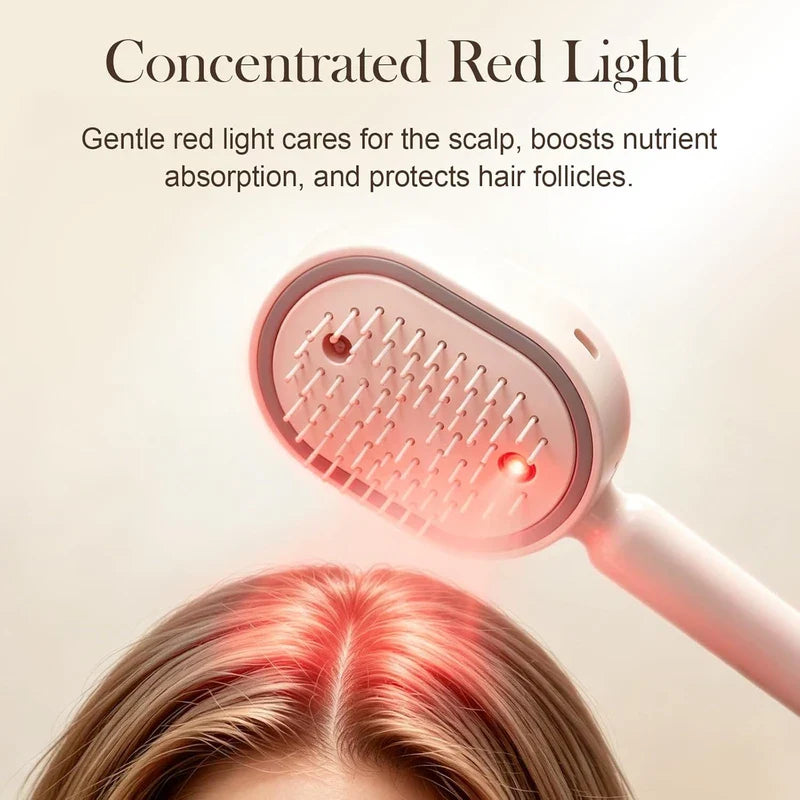 Electric Spray Air Cushion Massage Comb - Closeup of comb head emitting red light over the top of the scalp
