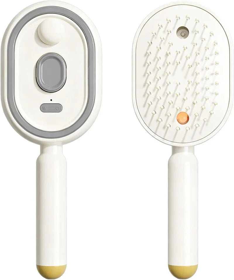 Electric Spray Air Cushion Massage Comb - Front and back view of a white handheld pet grooming brush, shown side by side against a plain white background.