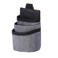 Car air vent storage pocket organizer clipped to a vehicle air vent