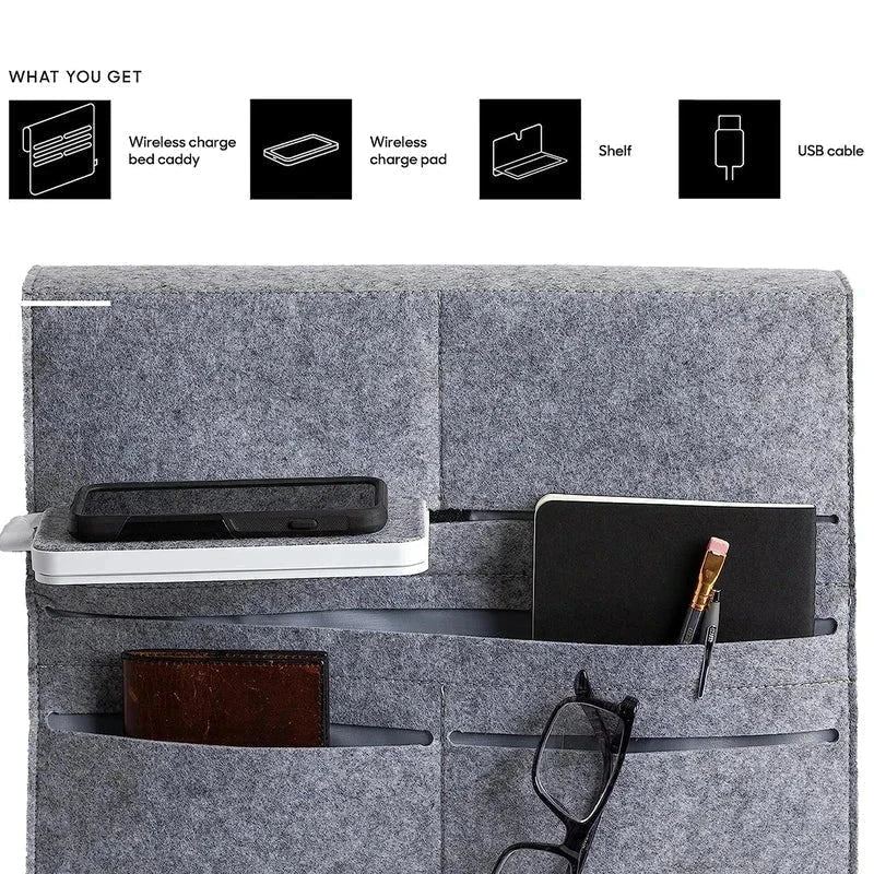 Felt Bedside Caddy Organizer Pocket Bag - Felt bedside organizer caddy with attached wireless charging pad, holding a phone case, small notebook, pen, wallet, and eyeglasses; included components listed above