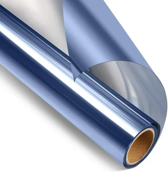 Roll of blue glossy reflective window film with a section lifted off the roll