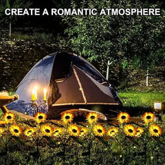 Sunflower Garden Lights - Lit flower-shaped lights arranged around a camping tent to create warm ambient evening lighting