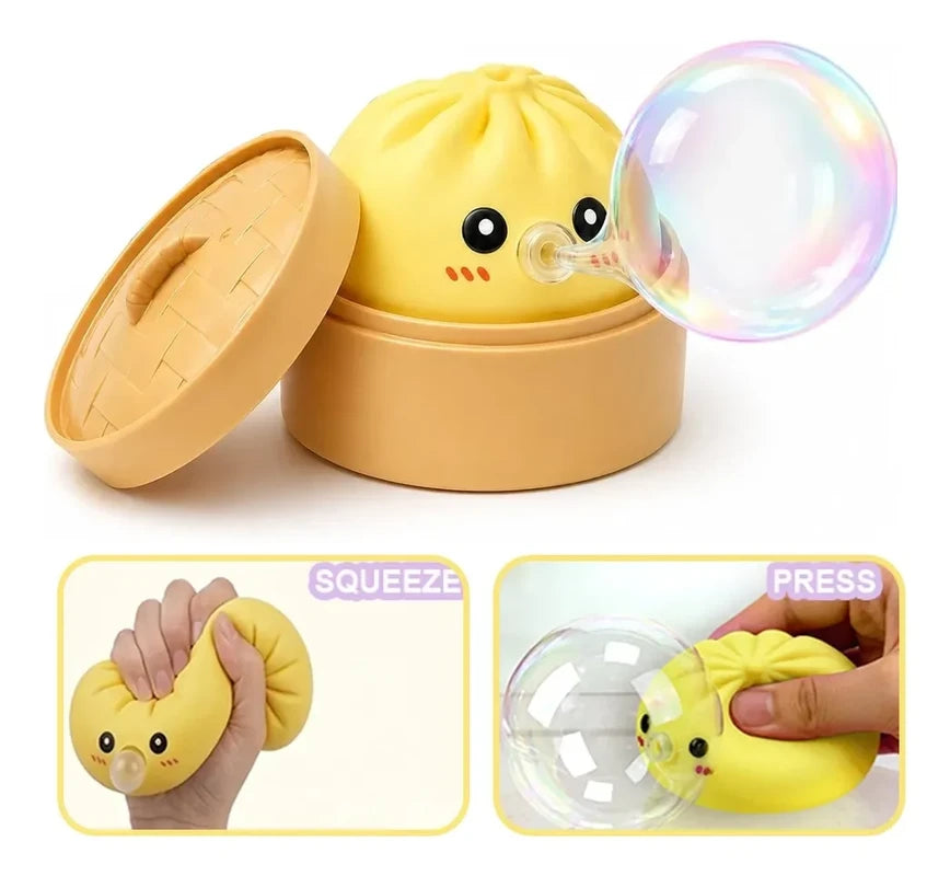 Sensory Bubble - Yellow steamed bun squish toy in a small steamer blows a clear bubble, with two inset panels showing squeezing and pressing the toy.