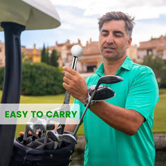 Golf Swing Training Aid - Golfer placing the compact trainer into a golf bag for easy transport