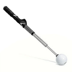Ayuda de entrenamiento de swing de golf: ayuda de práctica de swing con agarre moldeado, eje metálico telescópico y bola de golf blanca en el extremo, descansando sobre una superficie blanca