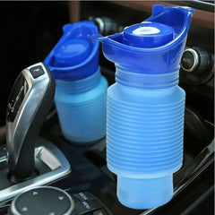 Two blue collapsible portable car urinals placed next to auto gear shift for emergency travel use