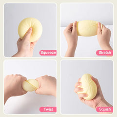 Squeeze, stretch, twist, and squish actions demonstrated on a yellow steamed bun squishy toy