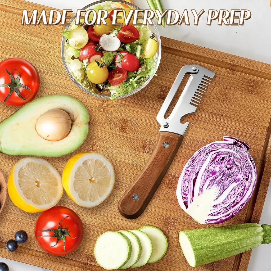 Multi-use peeler on bamboo cutting board surrounded by fresh prep ingredients: avocado, tomatoes, lemon, red cabbage, zucchini slices, and salad bowl; labeled 'Made for Everyday Prep'