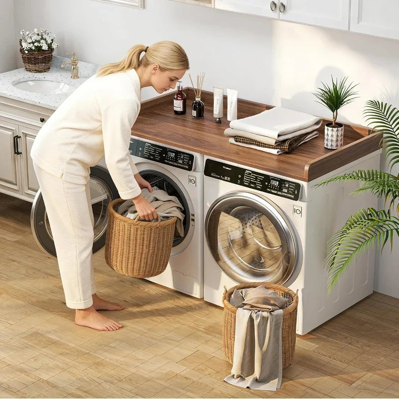 Woman doing laundry in bright laundry room with the wood washer dryer countertop installed